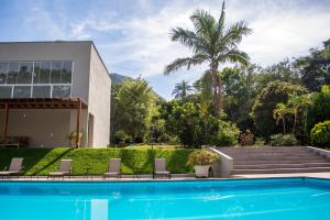 The swimming pool at or close to Pousada Recanto das Araras