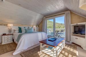 Postel nebo postele na pokoji v ubytování Amanzi Island Boutique Hotel + 37 fotografií
