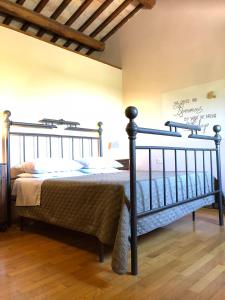 Postel nebo postele na pokoji v ubytování Agriturismo Podere Pescara