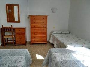 Postel nebo postele na pokoji v ubytování Pensión Rural Arroyo la Teja