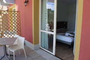 TV a/nebo společenská místnost v ubytování Hotel Bocciolo