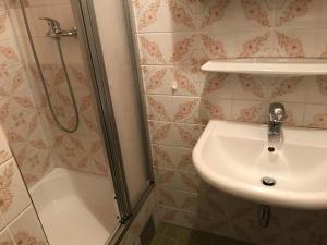 Koupelna v ubytování Stubalm Appartements + 29 fotografií