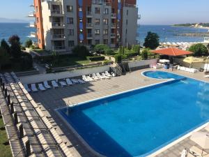 a view of a swimming pool at a hotel at Apartments Helios in Pomorie