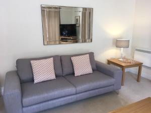 A television and/or entertainment centre at Blue Sky Apartments @Wallis Square, Farnborough