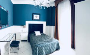Postel nebo postele na pokoji v ubytování Hotel Goya