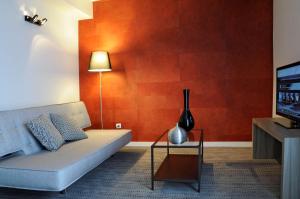 TV a/nebo společenská místnost v ubytování Best Western Plus Hôtel & Spa de Chassieu