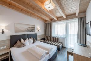 Voodi või voodid majutusasutuse rechenau LIVING & RELAX toas