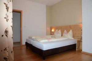 Postel nebo postele na pokoji v ubytování Villa Grünewald