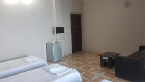 Televisor o centre d'entreteniment de Hotel Kvariati Nugo