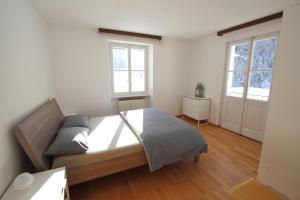 Voodi või voodid majutusasutuse Chalet Cuore delle Alpi toas
