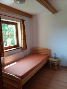 Postel nebo postele na pokoji v ubytování Horní Planá