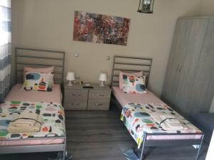 Cama o camas de una habitación en Petro’s Apartment
