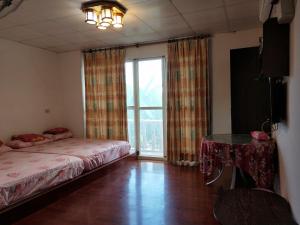 Letto o letti in una camera di Signal B&B 信號咖ㄟ厝 民宿