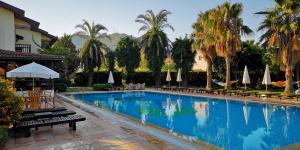 Bazén v ubytování Efe Hotel Gocek nebo v jeho okolí