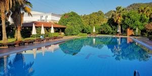 Bazén v ubytování Efe Hotel Gocek nebo v jeho okolí