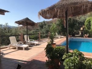 Bazén v ubytování Jardin Andaluz veleta nebo v jeho okolí + 16 fotografií