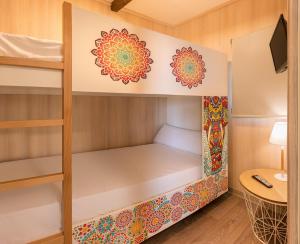 Łóżko lub łóżka w pokoju w obiekcie Magic Natura Resort