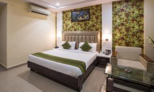 Ένα ή περισσότερα κρεβάτια σε δωμάτιο στο Hotel City Center Jodhpur