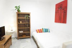 A television and/or entertainment centre at Archeros Oasis