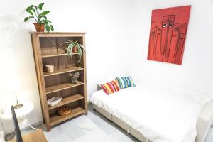 A bed or beds in a room at Archeros Oasis Még 15 kép