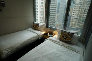 MK STAY - formerly HOTEL MK 객실 침대