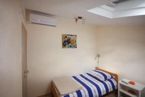 Posteľ alebo postele v izbe v ubytovaní Apartment Antonio