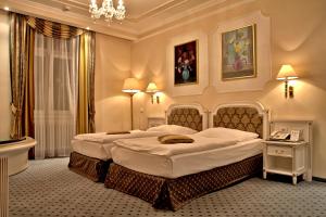 Postel nebo postele na pokoji v ubytování Esplanade Spa and Golf Resort