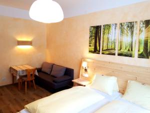 Postel nebo postele na pokoji v ubytování Bergfrieden Leutasch/Seefeld
