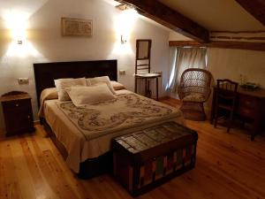 Cama o camas de una habitación en El Rincón de los Poetas