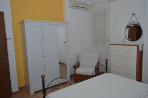 Postel nebo postele na pokoji v ubytování Ansise Guest House