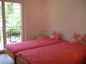 Un pat sau paturi într-o cameră la Residence Golf C 21