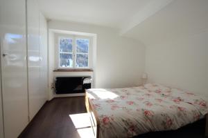 Voodi või voodid majutusasutuse Chalet Cuore delle Alpi toas