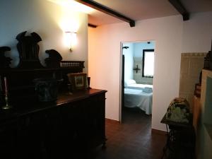 Łóżko lub łóżka w pokoju w obiekcie La pension del Parador