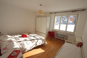 Voodi või voodid majutusasutuse Chalet Cuore delle Alpi toas