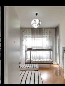 Posteľ alebo postele v izbe v ubytovaní Family Hostel Milano