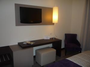 TV a/nebo společenská místnost v ubytování Hotel Complejo París