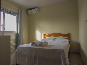 Кровать или кровати в номере Hospedagem do Peduca