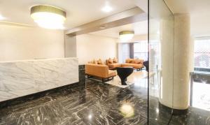 Treebo Elite Residency Belgaum的休息区