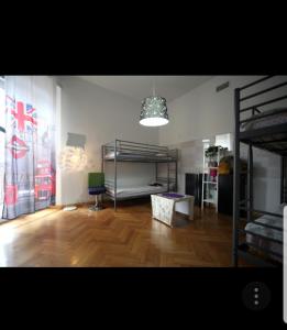 Posteľ alebo postele v izbe v ubytovaní Central Hostel Milano