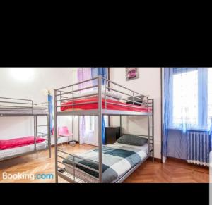 Posteľ alebo postele v izbe v ubytovaní Central Hostel Milano