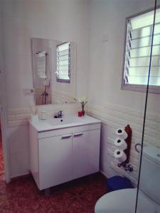 Ванная комната в Casa Belinda