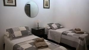 
Una cama o camas en una habitación de Duplex Posta de la Villa
