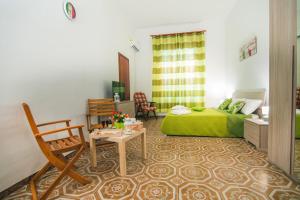 Posedenie v ubytovaní B&B U PRUFISSURI