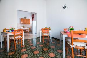 Reštaurácia alebo iné gastronomické zariadenie v ubytovaní B&B U PRUFISSURI