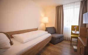 Postel nebo postele na pokoji v ubytování Hotel Mediterra