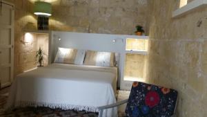 Letto o letti in una camera di Magic in the Heart of Old Gozo (First Floor)