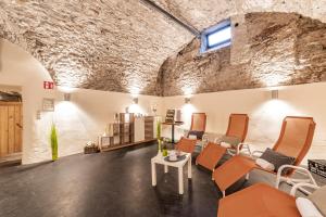 Posedenie v ubytovaní JUFA Hotel Murau