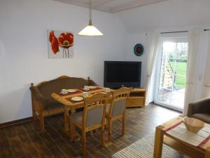 TV a/nebo společenská místnost v ubytování Lindenhof-Dangast