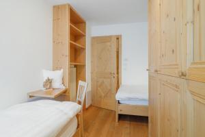 A bed or beds in a room at Appartamento Boschetto Giulia