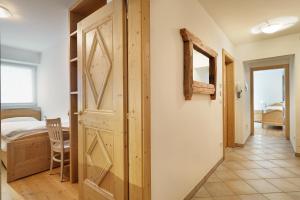 A bed or beds in a room at Appartamento Boschetto Giulia